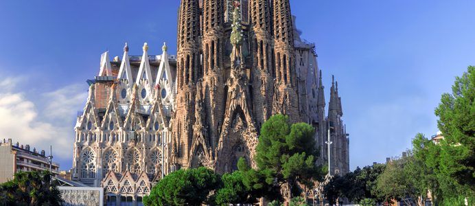 BARCELONA, SPAIN - OCTOBER 8: La Sagrada Familia - cathedral designed by Antonio Gaudi, view from the oldest facade at the morning, October 8, 2014 in Barcelona, Spain.